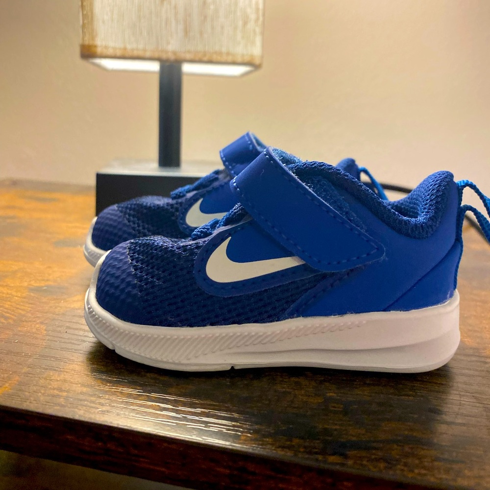 Adorable blue and white toddler Nike sneakers. Good shape, barely worn.